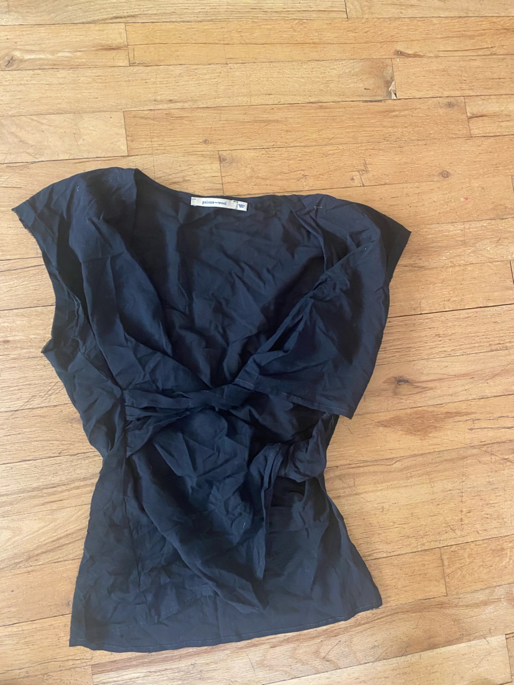 Black Paloma wool top. Very sheer and lightweight fabric. Size medium.
